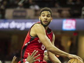 Toronto Raptors' Cory Joseph passes against the Cleveland Cavaliers during the first half of an NBA preseason basketball game in Cleveland, Thursday, Oct. 13, 2016. (AP Photo/Phil Long)