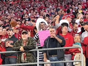 Distasteful Barack Obama costume spotted at Wisconsin Badgers football game on Oct. 29 (Twitter - @woahohkatie)