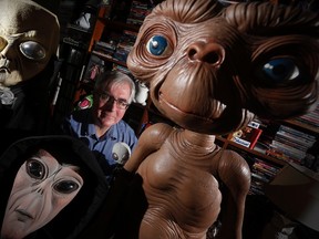 Chris Rutkowski, Canada's foremost UFO expert, whose day job is at the University of Manitoba, is photographed in his Winnipeg home, Saturday, Oct. 29, 2016. After three decades being known as one of Canada's top UFO experts, Rutkowski doesn't mind a bit of good-natured ribbing now and then. (THE CANADIAN PRESS/John Woods)