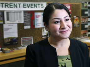 Peterborough-Kawartha MP and Democratic Institutions Minister Maryam Monsef responds to reporters who asked about her citizenship situation after talking to Trent University officials at the Bata Library to announce $7 million coming from the federal government as part of the $14-million renovation of the Bata Library on Wednesday October 12, 2016 in Peterborough, Ont. (Clifford Skarstedt/Peterborough Examiner/Postmedia Network)