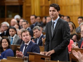 Prime Minister Justin Trudeau delivers a speech at the start of the Paris Agreement debate in the House of Commons on Parliament Hill in Ottawa on Monday, Oct. 3, 2016. Trudeau announced the federal Liberal government will establish a "floor price'' on carbon pollution of $10 a tonne in 2018, rising to $50 a tonne by 2022. (THE CANADIAN PRESS/Sean Kilpatrick)