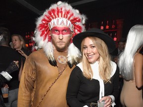 Hilary Duff, right, and Jason Walsh attend the Casamigos Halloween Party at a private residence on October 28, 2016 in Beverly Hills, California. (Photo by Michael Kovac/Getty Images for Casamigos Tequila)