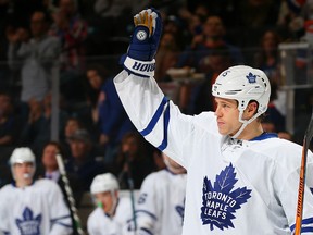 Former Islander and current Maple Leafs forward Matt Martin salutes the crowd during a break in the action on Sunday night at the Barclays Center in Brooklyn, N.Y. (GETTY IMAGES)