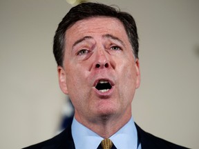 In this July 5, 2016, file photo, FBI Director James Comey makes a statement at FBI Headquarters in Washington regarding its investigation into Hillary Clinton's use of a private email server while secretary of state. Every presidential race has its big moments. This one, more than most. (AP Photo/Cliff Owen, File)