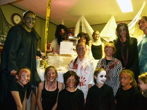 The Belfour's had plenty of volunteer help for their last Haunted House Oct. 28. Pictured, (back row, from left) Dan Belfour, James McCarthy, Caleb Templeman, Bree Belfour, (middle row, from left) Juanita Belfour, Sami McCarthy, Laura McCarthy, Cass Smith, Stef Smith, (front row, from left) Gwen McKay, Maya Belfour, Joy Belfour, Lauren McKay, Haddie McLaughlin and Ally McMann. GALEN SIMMONS MITCHELL ADVOCATE