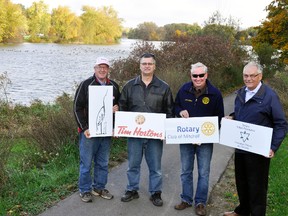 West Perth Mayor Walter McKenzie (left), Bert Vorstenbosch, representing Tim Hortons; Paul Van Gerwen, representing the Rotary Club of Mitchell, and Perth-Wellington MPP Randy Pettapiece, representing the Ontario Trillium Foundation, officially opened the hard-topped portion of the trail in Mitchell Oct. 22. ANDY BADER MITCHELL ADVOCATE