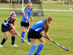 Emily Ruby (foreground) and Makayla Meinen of the Mitchell District High School (MDHS) field hockey team go on the attack during Huron-Perth action Oct. 17. GALEN SIMMONS MITCHELL ADVOCATE
