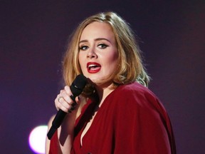 This Feb. 24, 2016 file photo shows Adele onstage at the Brit Awards 2016 at the 02 Arena in London.  (Photo by Joel Ryan/Invision/AP, File)