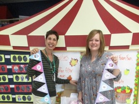 Renee Ethans, (left) manager of the Child Life Department at Winnipeg's Children's Hospital, accepts birthday boxes from The Frosting Foundation's Melanie Beaudin last September. (SUPPLIED PHOTO)