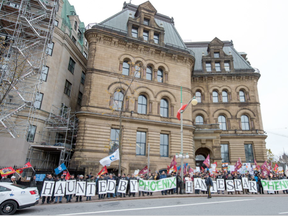 PSAC members demonstrate in front of Prime Minister Justin Trudeau's offices in the Langevin Block at Wellington and Elgin Streets to remind him to make good on his word to respect public services and the people who provide them.  (Wayne Cuddington/ Postmedia)