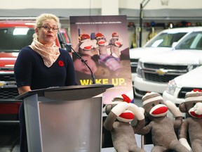 Jodie Santarossa recounts how she dismissed symptoms of carbon monoxide poisoning before finding out her furnace was leaking the potentially deadly poison gas at the launch of Carbon Monoxide Awareness Week on Monday, Oct. 31, 2016, at Fire Station #1 at 10351 96 Street in Edmonton, Alta. CLAIRE THEOBALD
