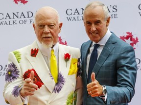 Don Cherry and Ron MacLean at the unveiling of their star on the Canada Walk of Fame on King St. in Toronto on Monday July 25, 2016. Dave Thomas/Toronto Sun/Postmedia Network