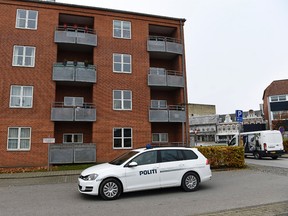 Police vehicles outside an apartment building in Aabenraa, Denmark, Monday Oct. 31, 2016, where Danish police say the remains of a 27-year-old Syrian woman and her two daughters, aged 7 and 9, were found in a freezer inside their apartment. Police made the gruesome discovery Sunday in the town of Aabenraa after a relative of the woman told them he hadn’t been able to reach her for a few days. (Claus Bonnerup/AP via Polfoto)