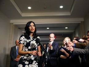 In this Oct., 16, 2015 file photo, Huma Abedin, a longtime aide to Hillary Rodham Clinton, speaks to the media after testifying at a closed-door hearing of the House Benghazi Committee, on Capitol Hill in Washington. The longtime Hillary Clinton aide at the center of a renewed FBI email investigation testified under oath four months ago she never deleted old emails, despite promising in 2013 not to take sensitive files when she left the State Department. (AP Photo/Alex Brandon, File)