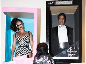 Beyonce and Jay Z dressed as black Barbie and Ken for Halloween and posted this family photo to Instagram. (Instagram.com/beyonce)