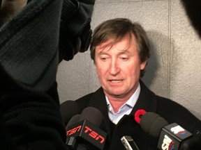 Wayne Gretzky speaks to reporters at the Leafs/Oilers morning skate in Toronto on Tuesday, Nov. 1, 2016 (Terry Koshan/Toronto Sun/Postmedia Network)