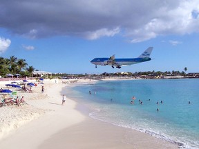 It is the end of an era for KLM and the end of a popular photo op for tourists, who clamour to the beach to get shots of the low-flying jumbo jet. (Postmedia Network file photo)