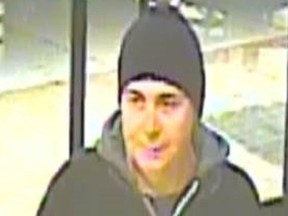 Security camera image of man wanted in fast-food robbery investigation (Toronto Police handout)