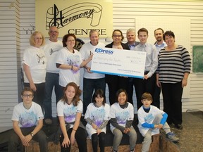 Staff from Sarnia's Express Employment Professionals present a $1,500 cheque to Harmony For Youth on Oct. 24. 
CARL HNATYSHYN/SARNIA THIS WEEK