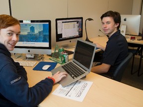 Sean Cornelius, 15, left, is chief executive and Jake Thorburn, 15, is chief financial officer at Geco Digital Labs at the Western Research Park. (MIKE HENSEN, The London Free Press)