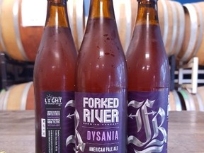 Forked River?s Dysania American Pale Ale has been rebranded to support the Shine the Light on Women Abuse campaign and will be donating  50 cents from every bottle sold to the cause. (Special to Postmedia News)
