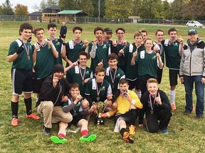The Nicholson Crusaders celebrate their COSSA A junior boys soccer championship Tuesday in Port Hope.