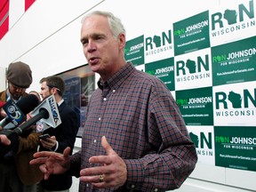 In this May 13, 2016, file photo, Sen. Ron Johnson, R-Wis., speaks with reporters in Green Bay, Wis. Hillary Clinton could face impeachment if she is elected president because her use of a private email server as secretary of state broke the law, Johnson contends. In an interview, Johnson told the Beloit Daily News on Oct. 31, that Clinton “purposefully circumvented” the law. The Republican said, “this was willful concealment and destruction” involving information related to national defense. (AP Photo/Scott Bauer, File)
