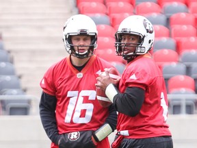 Quarterback Henry Burris (right) will be rested this week against the Bombers. QB Brock Jensen is pumped to get playing time. (Jean Levac/Postmedia network)