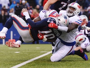 Bills inside linebacker Zach Brown sacks Patriots’ Jimmy Garoppolo on Sunday. The Patriots won 41-25. (AP)