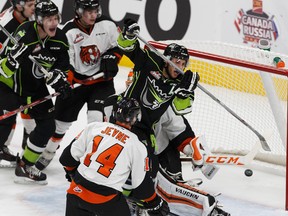 Tyler Robertson scores on Medicine Hat goaltender Nick Schneider during Sunday's game at Rogers Place. (Ian Kucerak)