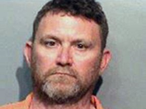 This undated photo provided by the Des Moines Police Department shows Scott Michael Greene, of Urbandale, Iowa. Des Moines and Urbandale Police said in a statement Wednesday, Nov. 2, 2016, that they have identified Greene as a suspect in the killings early Wednesday morning of two Des Moines area police officers. The two officers were shot to death in separate ambush-style attacks while they were sitting in their patrol cars. (Des Moines Police Department via AP)