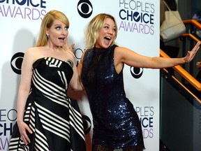 Actors Melissa Rauch and Kaley Cuoco winners of Favorite Network TV Comedy and Favorite TV Show for 'The Big Bang Theory', pose in the press room during the People's Choice Awards 2016 at Microsoft Theater on January 6, 2016 in Los Angeles, California. Reports say Cuoco is unhappy with the amount of attention being given to the pregnancy plot of Rauch's character, Bernadette. (Photo by Kevork Djansezian/Getty Images)