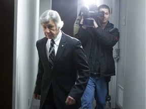 Dr Norman Barwin makes his way to the disciplinary hearing at the College of Physicians and Surgeons in 2013. Chris Young/Postmedia