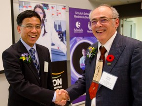 Ting-Yim Lee, left, and Frank Prato both have funded research positions to advance medical imaging as part of a collaboration between Western University and St. Joseph?s Health Care London. (MIKE HENSEN, The London Free Press)