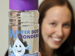 Luke Hendry/The Intelligencer
Program manager Emma Pillsworth fills a refillable water bottle at a filling station at Hastings Prince Edward Public Health Wednesday in Belleville.