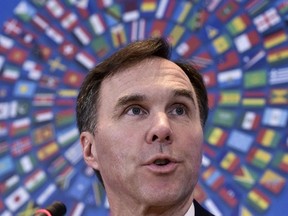 Finance Minister Bill Morneau speaks during a press conference during the annual International Monetary Fund, World Bank Spring Meetings at the IMF on April 15, 2016 in Washington, D.C. (MANDEL NGAN/AFP/Getty Images)