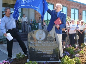 Canadian comedy icon, Dave Broadfoot, who died on Tuesday at the age of 90, once said there were a lot of parking lots named after deceased people in Kingston. So then Kingston Whig-Standard photo editor and columnist Jack Chiang came up with the idea to honour Broadfoot with an un-memorial monument in the Whig-Standard parking lot in September 2003. Former Whig-Standard publisher Fred Laflamme is pictured here at the unveiling with Broadfoot. (Ian MacAlpine/The Whig-Standard)