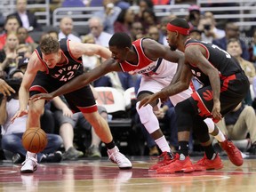 Jakob Poeltl of the Toronto Raptors and Andrew Nicholson of the Washington Wizards go after a loose ball in the first half at Verizon Center on Nov. 2, 2016 in Washington. (Rob Carr/Getty Images)