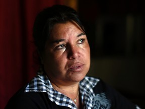 In this 22 Oct. 2016 photo, Juana Poblete cries as she talks about her daughter, Lissette, who died under the care of the Chilean state, in Til Til, Chile. The former head of the National Service for Minors later said that Lisette died because she was "conflictive." But a police investigation has shown that the child's caretakers were partly responsible for her death and failed to administer the CPR that could have saved her life. (AP Photo/Luis Hidalgo).