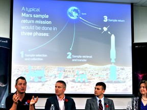 Tim Haltigin, a Canadian Space Agency senior mission scientist (left), speaks during a briefing about the ongoing CanMars 2016 Mars Sample Return Analogue Mission in London Ont. November 2, 2016. Also pictured: Gordon Osinski, an associate professor at Western University, Raymond Francis, a scientific software application engineer from NASA’s jet propulsion laboratory, and Elise Harrington, a Western University master’s degree candidate. CHRIS MONTANINI\LONDONER\POSTMEDIA NETWORK