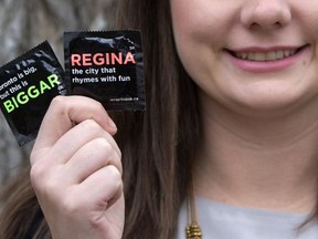 Saskatoon Sexual Health Centre Executive Director Jillian Schwandt poses Tuesday, October 25, 2016 with condoms which are part of the 'WrapItUp' Campaign which launches November 2. (GREG PENDER/STAR PHOENIX)