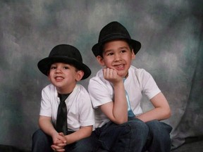 Noah Barthe, left, and Connor Barthe pose in this undated photo posted on the Facebook page of Mandy Trecartin.  Police in New Brunswick have charged Jean-Claude Savoie with criminal negligence causing death after two young brothers were asphyxiated by a python. The Savoie criminal negligence trial is currently underway. (THE CANADIAN PRESS/HO- Facebook)