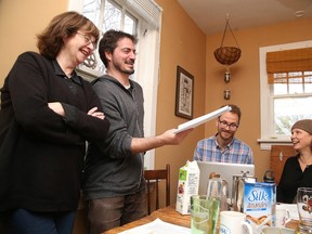 In this file photo, Lisa O'Connell, artistic director at Pat The Dog Theatre Creation, looks on as actor Rick Duthie reads lines from The Mourning Show and writers Matthew Heiti and Lara Bradley watch. PlaySmelter returns next month. Gino Donato/Sudbury Star/Postmedia Network