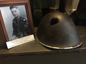 John Waye Burton’s helmet, which he was wearing when it was hit by shrapnel during the Second World War. His story is featured on the TV show War Junk on Nov. 10.(Supplied photo)