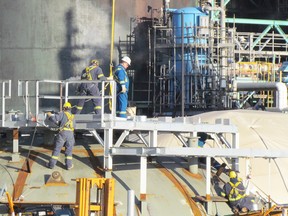 A construction crew is at work at the Imperial Oil manufacturing site on Thursday November 3, 2016 in Sarnia, Ont. The Sarnia-Lambton Workforce Development Board has released this year's Local Labour Market Update. (Paul Morden/Sarnia Observer)