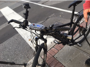 A sonar device is mounted to the police bike patrol's handle bars. The $1,000 high-tech device measures how close cars are as they pass their bikes. (Ottawa Police Service Twitter photo)