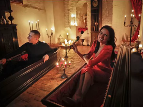 Tami Varma and her brother Robin, prepare to bed down for the night in a coffin in Bran Castle, Romania on Halloween night. (Vadim Ghirda, AP)