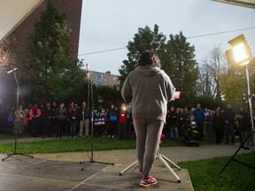 Suzy Gursoy, of Kitchener-Waterloo, talks about her experiences as a homeless person, during an observance at Campbell Memorial Park in London Thursday honouring those who have died as a result of homelessness. (MIKE HENSEN, The London Free Press)