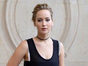 This file photo taken on September 30, 2016 shows actress Jennifer Lawrence as she poses before the Christian Dior 2017 Spring/Summer ready-to-wear collection fashion show in Paris. (PATRICK KOVARIK/AFP/Getty Images)