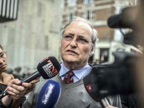 Nazi hunter Efraim Zuroff talks to the media outside a police station in Copenhagen, Denmark, Tuesday, July 21, 2015. (Anthon Unger/POLFOTO via AP)